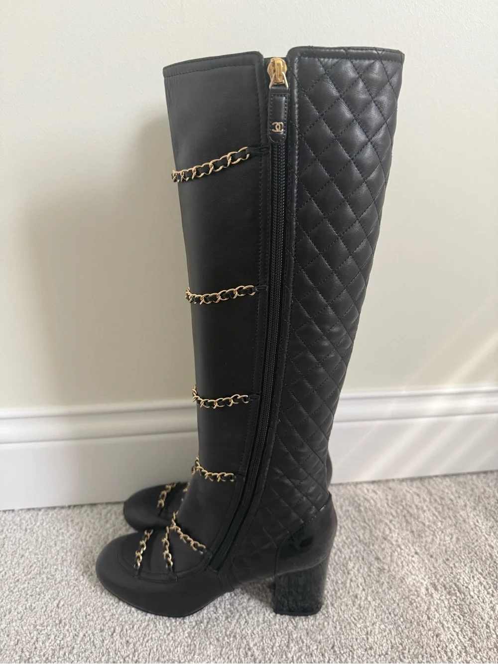 CHANEL Black knee-high lambskin leather boots
